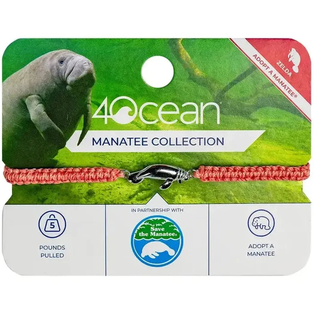 A 4Ocean Manatee Collection bracelet with a coral cord and manatee charm, showing the "Adopt a Manatee" partnership logo and manatee image on the packaging.