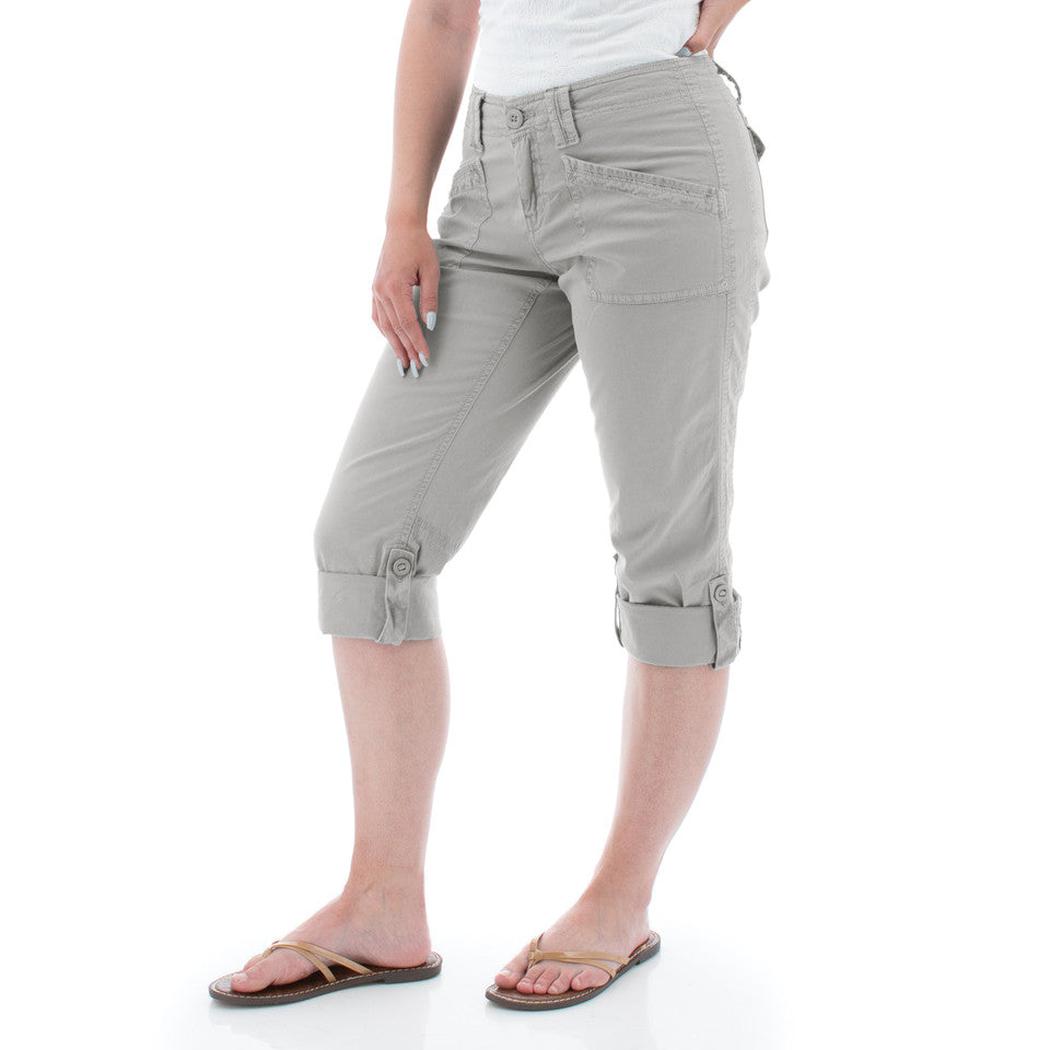 Side view of the Aventura Women's Arden V2 Capri in Quarry showing the rolled cuffs and a model wearing them against a white background.