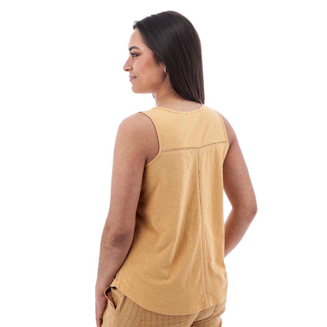 Back view of the Aventura Women's Simone Tank Top in Amber Gold showing the back seam and a model wearing it against a white background.