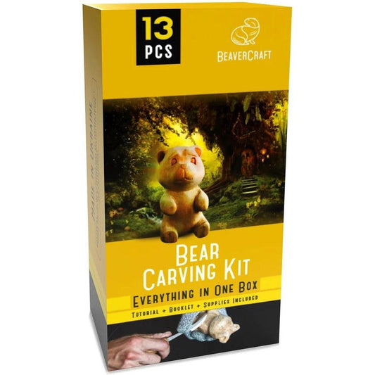 A front view of the Beavercraft Bear Carving Kit box showing a bear model and a hand carving a bear against a forest background.