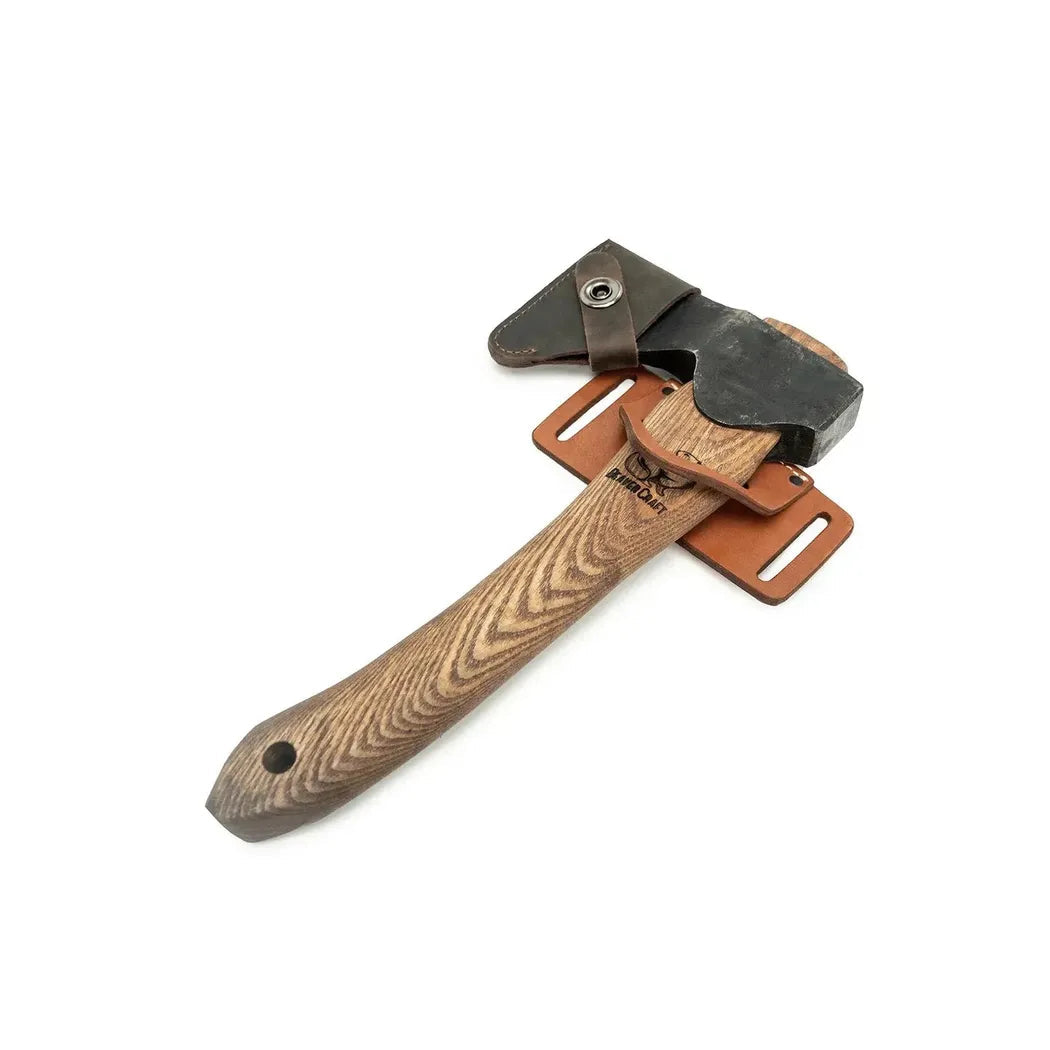 A top-down view of the Beavercraft Leather Tool Belt Hanger with a charcoal/ graphite axe head and brown leather hanger against a white background.