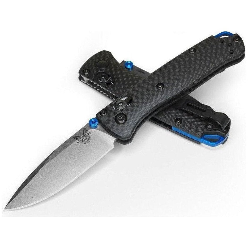 A side view of the Benchmade Mini Bugout knife with a charcoal/ graphite handle and blue accents against a white background.