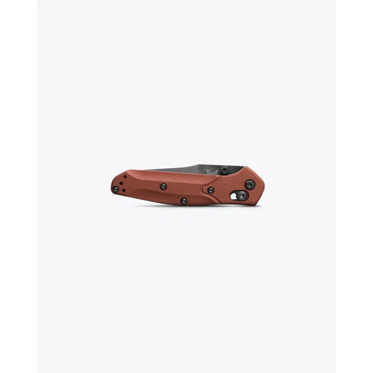 Side view of the Benchmade Mini Osborne with a brown handle and black accents against a plain white background.