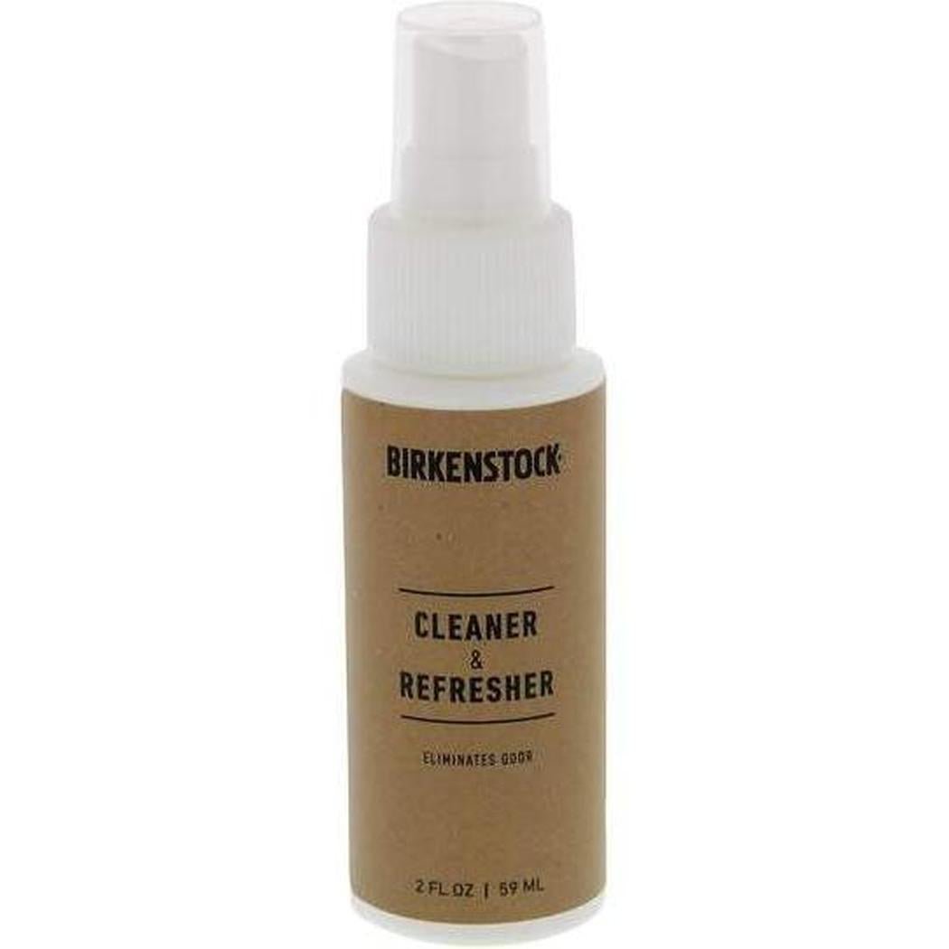 A front view of a Birkenstock Cleaner & Refresher spray bottle with a brown label against a white background.