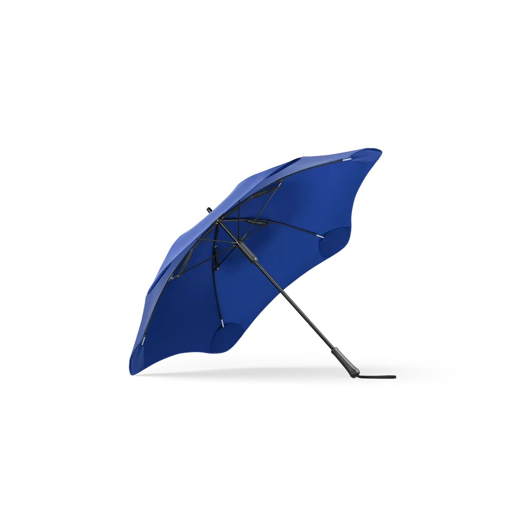 Side view of the Blunt Classic Black umbrella with a sleek handle against a white background.