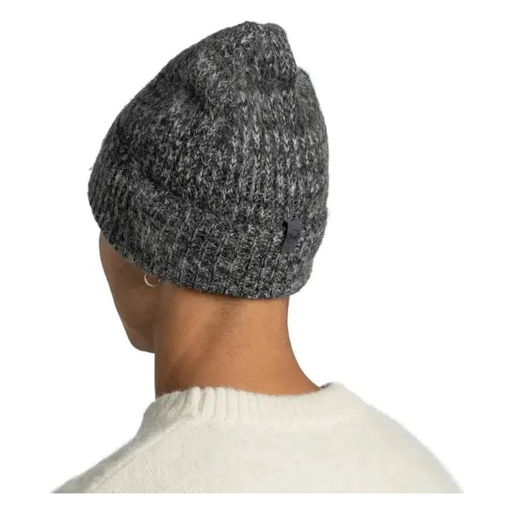 Back view of the Buff Knitted Beanie - Irna in Graphite on a model wearing a white sweater against a white background.