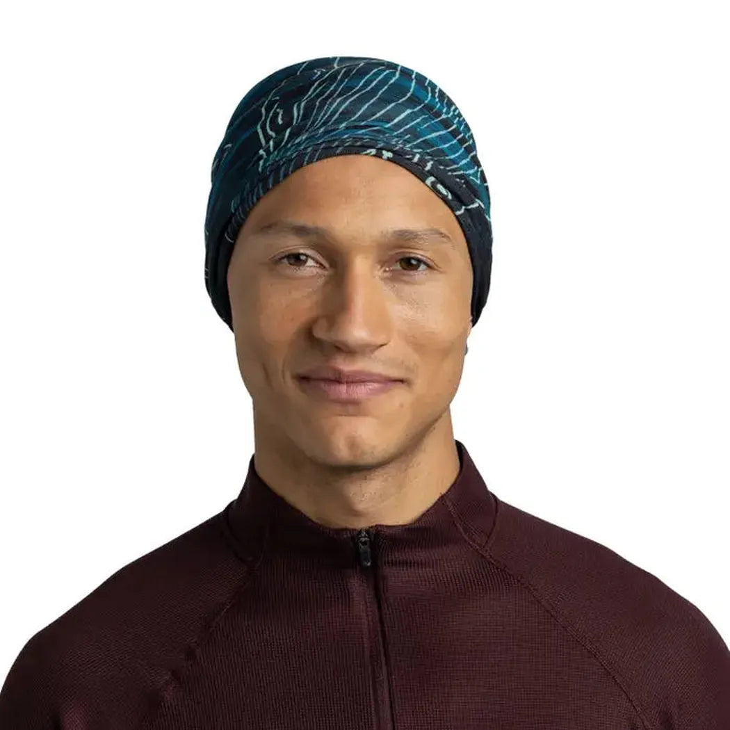 A front-facing photo of a model wearing the Buff Original Ecostretch - Bryn in Tourmaline, against a plain white background.