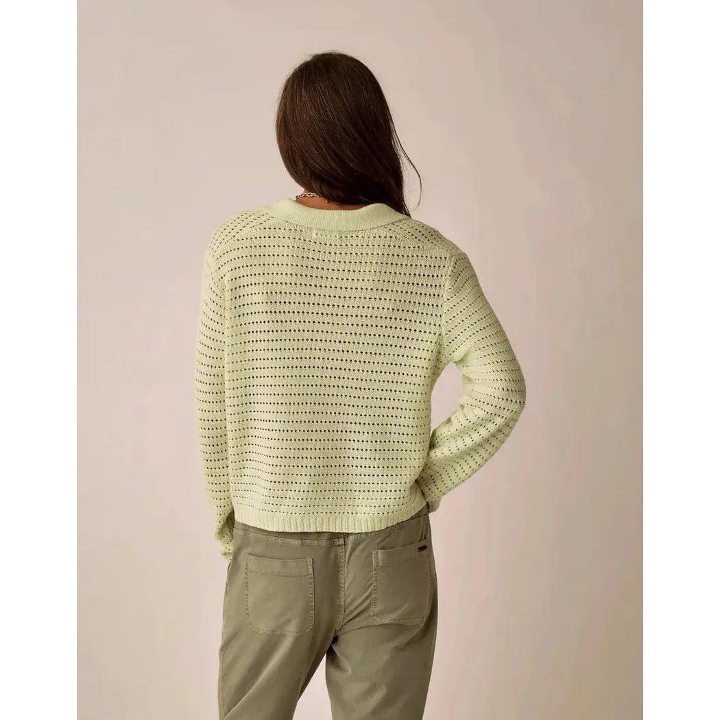 Back view of the Carve Designs Women's Morgan Polo Sweater in Cloud, showing the model wearing it against a neutral background.