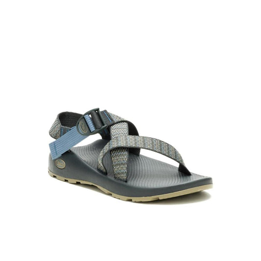 Side view of the Chaco Men's Z1 Classic Bit Graphite sandals showing the adjustable buckle and textured outsole against a white background.