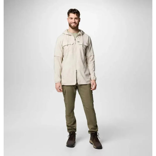 A front view of the Columbia Sportswear Men's Skien Valley Hooded Long Sleeve Shirt in Dark Stone on a model against a light gray background.