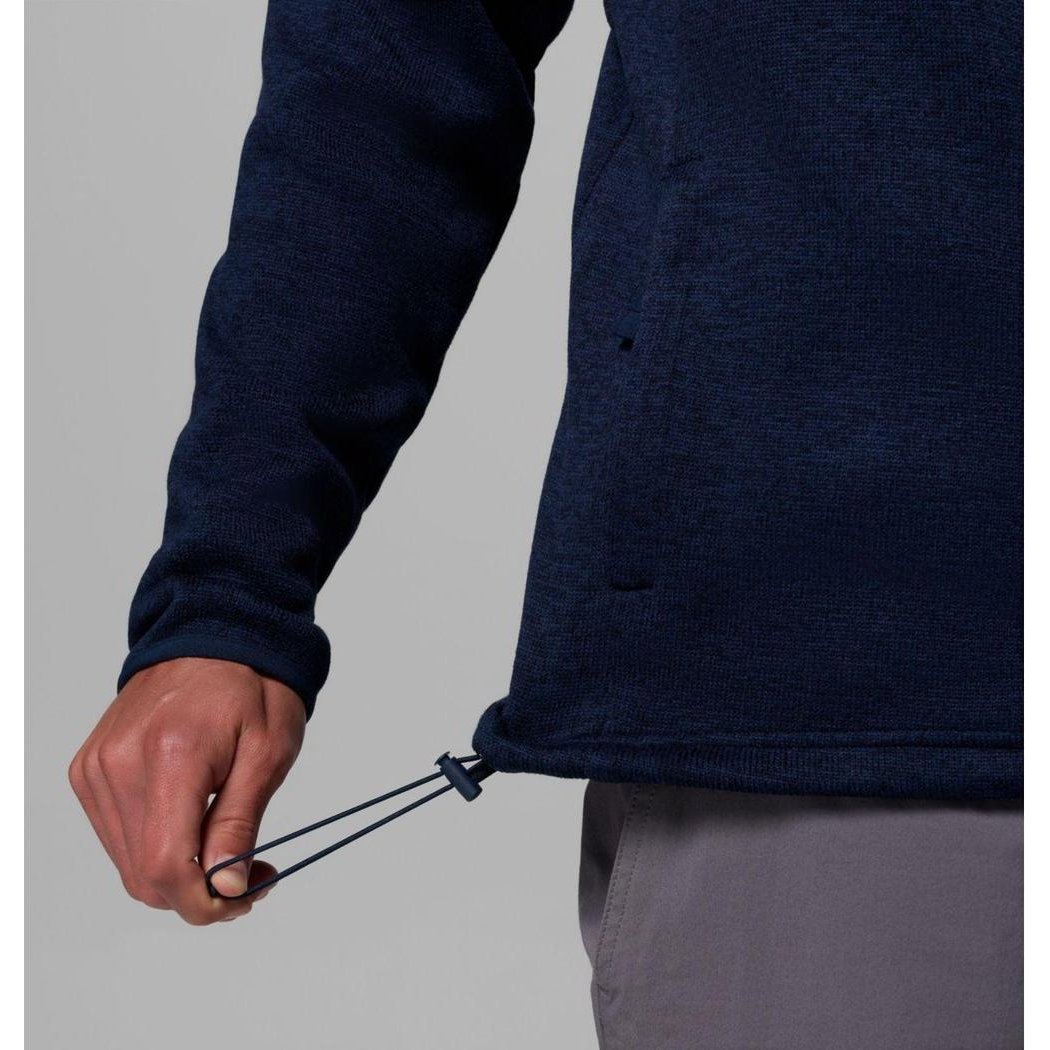 A close-up of the Columbia Sportswear Men's Sweater Weather Full Zip Jacket in Collegiate Navy Heather, showing the drawcord at the hem against a plain background.