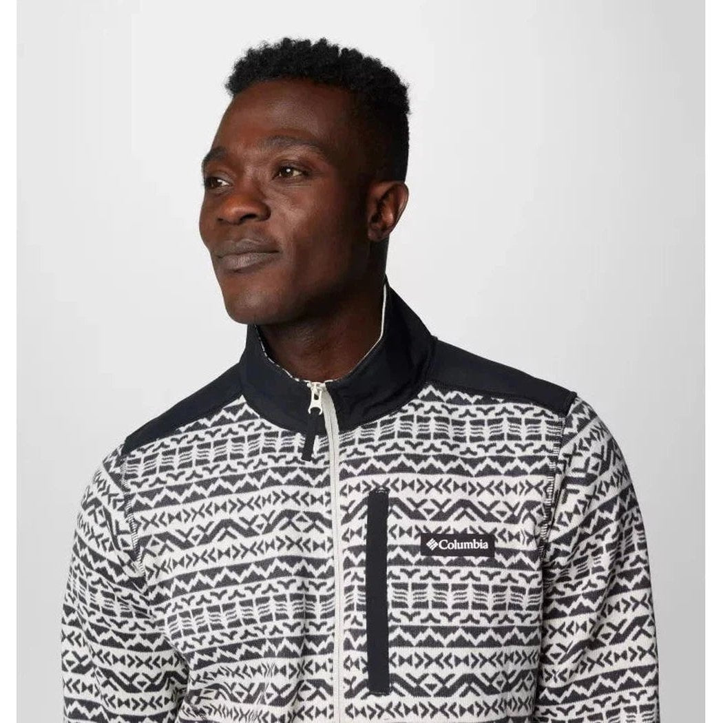 A man in a Columbia Sportswear Men's Sweater Weather Printed Half Zip jacket with a dark collar and a printed pattern, photographed from the front against a plain white background.