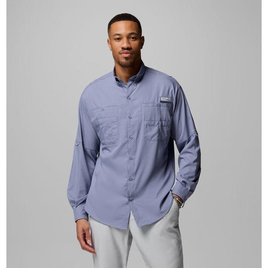 A model wears the Columbia Sportswear Men's Tamiami II Long-Sleeve Shirt in Fossil against a plain gray background.