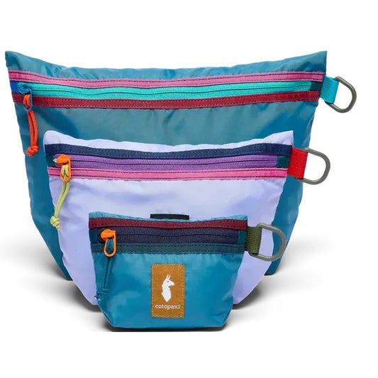 Front view of the Cotopaxi Cubo Pouch Organizers in Del Dia showing the three pouches and carabiners against a white background.