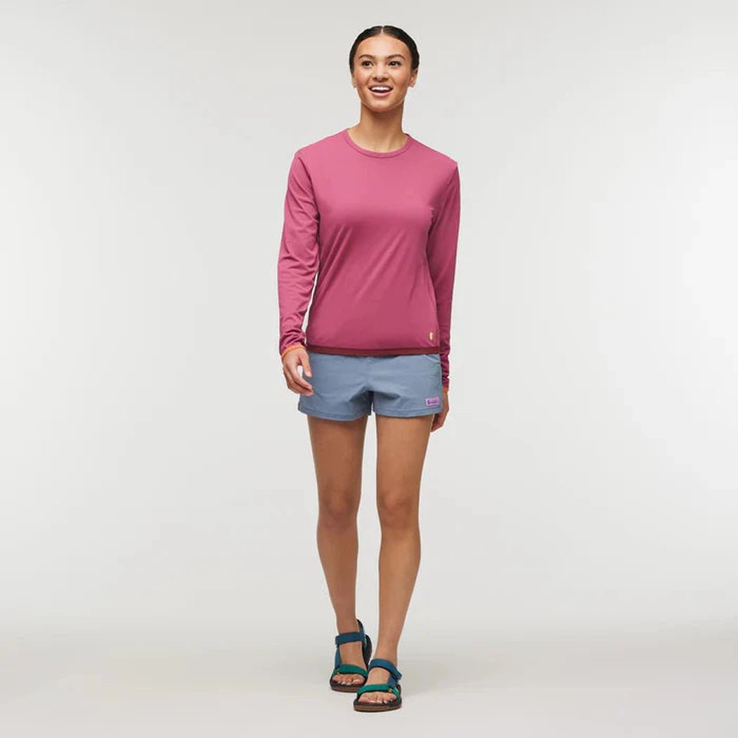 A model wearing the Cotopaxi Women's Brinco Short in Tempest stands against a plain white background.