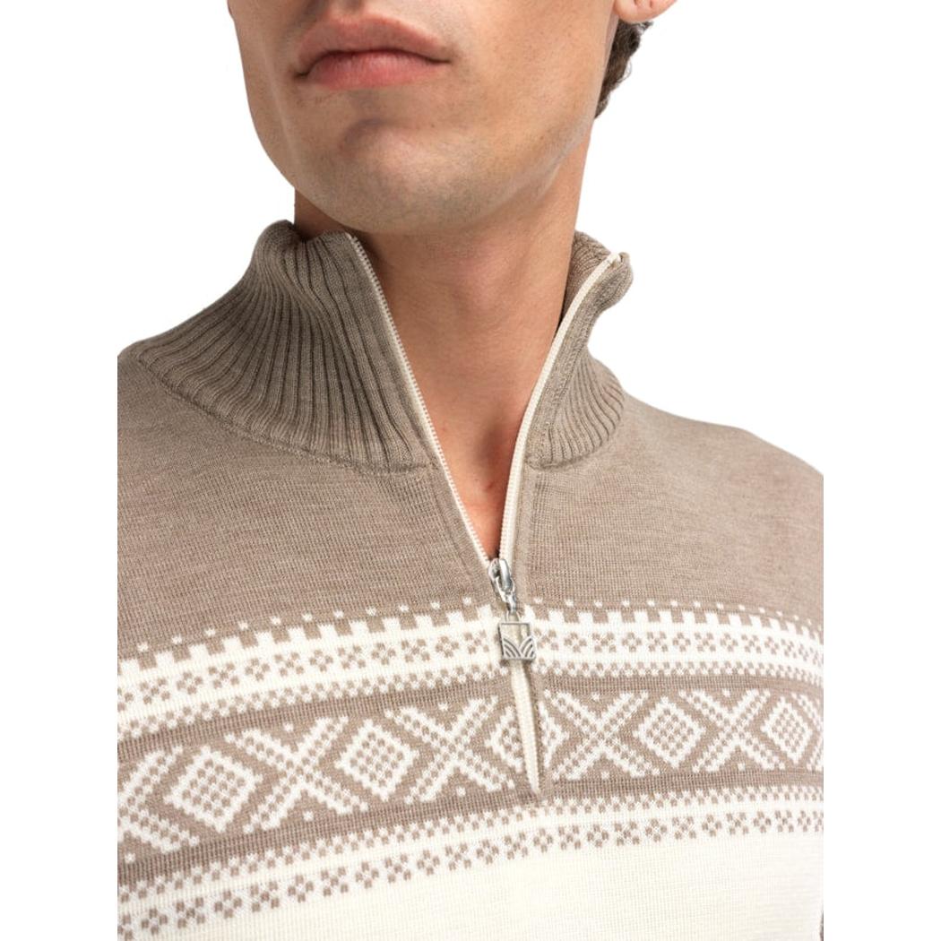 A close-up of the Dale Of Norway Men's Dalestølen Sweater in Navy Offwhite, showing the half-zip and patterned design on a model against a white background.