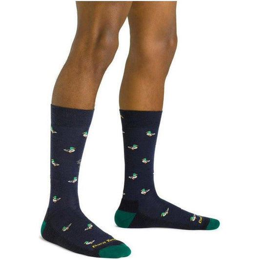 A front view of Darn Tough Men's Duck Duck Moose Crew Lightweight with Cushion socks in Eclipse on a model's legs against a white background.