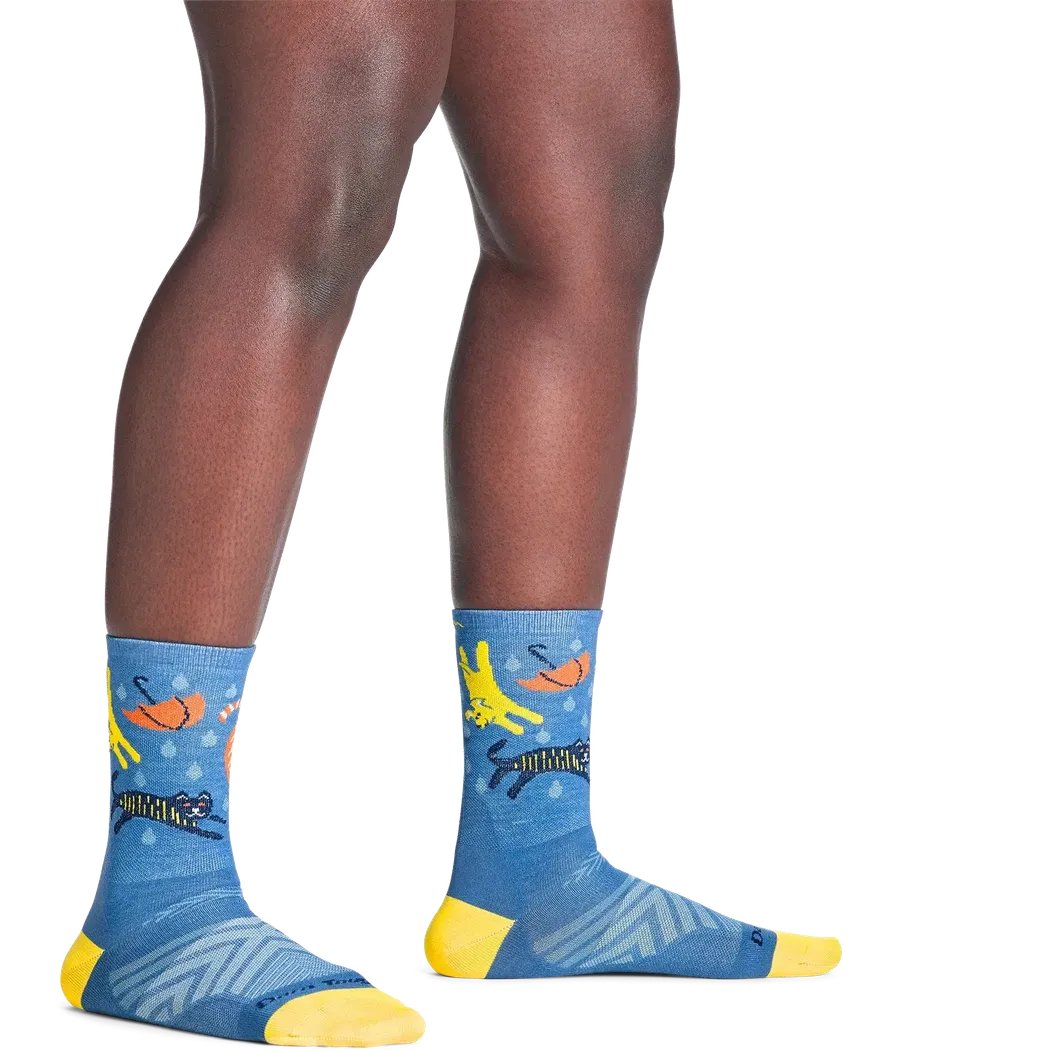 Side view of Darn Tough Women's Ruff Weather Micro Crew Ultra-Lightweight Running Socks in Storm showing the yellow toe and heel on a model against a white background.