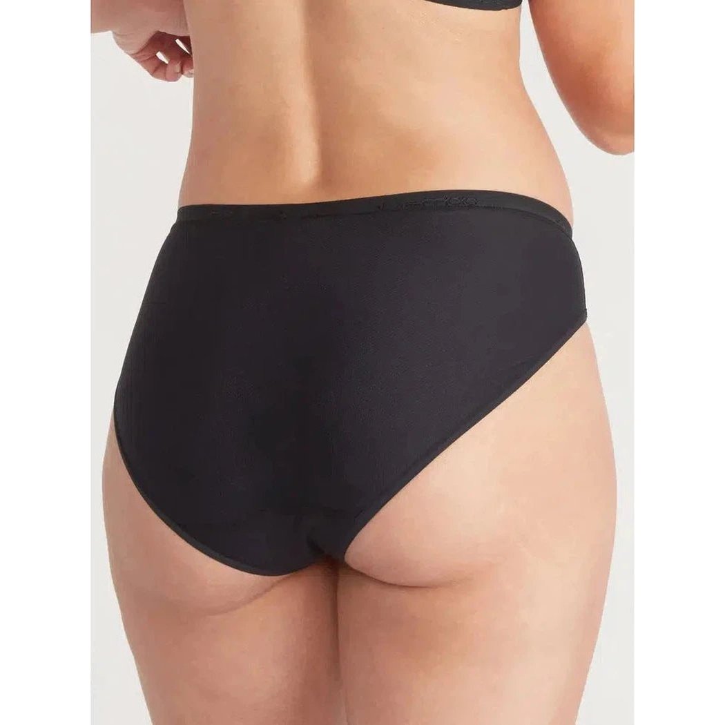 Back view of the Exofficio Women's Give-N-Go 2.0 Bikini Brief in Bellini Mosaic on a model against a plain white background.