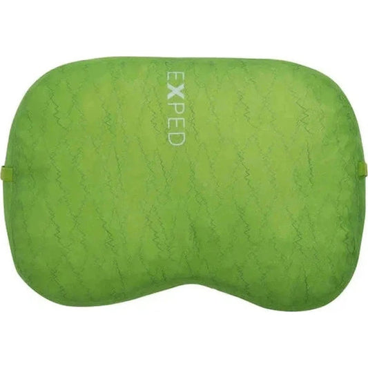 A green Exped DeepSleep Pillow M with a wavy pattern is shown from a top-down angle against a white background.