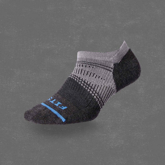 A side view of the FITS Light Cushion Run No Show sock in Lavender Herb against a gray background.