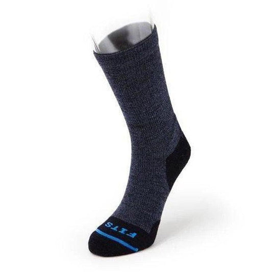 Side view of the FITS Light Hiker Crew sock in Brown with a black heel and toe against a white background.