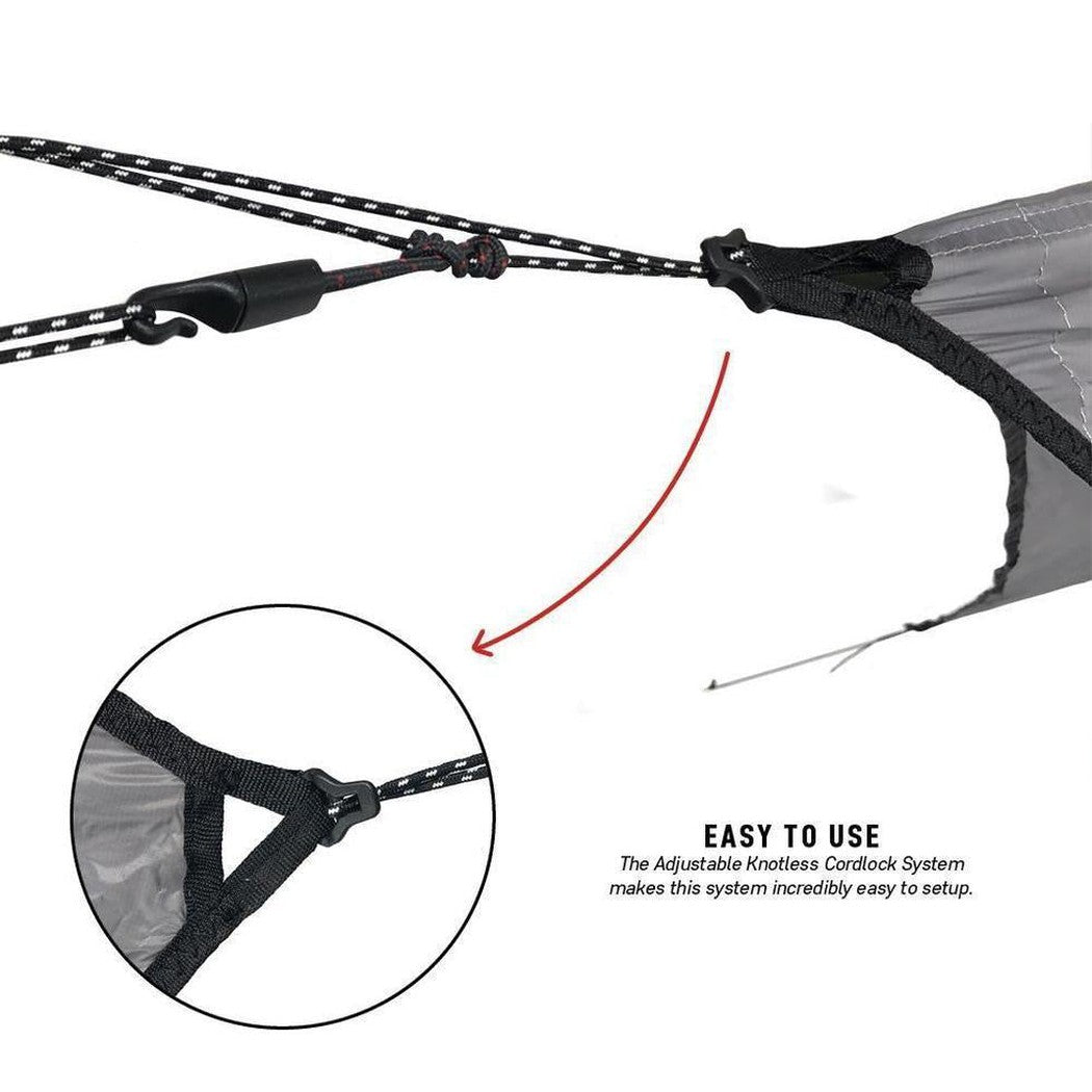 A close-up of the Grand Trunk Air Bivy All-Weather Shelter showing the adjustable knotless cordlock system and a zoomed-in detail of the attachment.