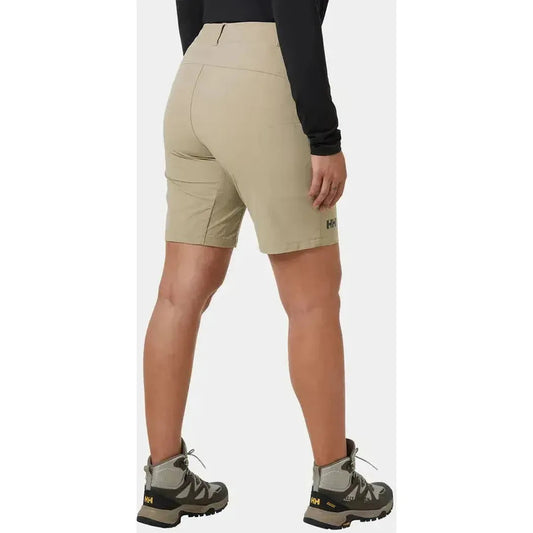 Back view of the Helly Hansen Women's Brona Softshell Shorts in Pebble, showing the model wearing them with hiking boots against a plain background.