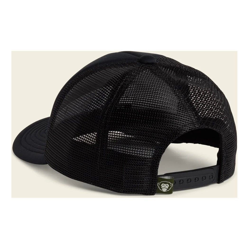 Back view of the Howler Brothers Foam Dome hat showing the mesh back and adjustable strap with a green logo tag against a light background.