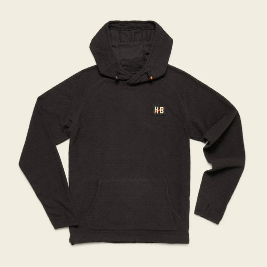 A front view of the Howler Brothers Men's Palo Duro Fleece Hoodie in Antique Black with a front pocket and "HB" logo on the chest against a white background.