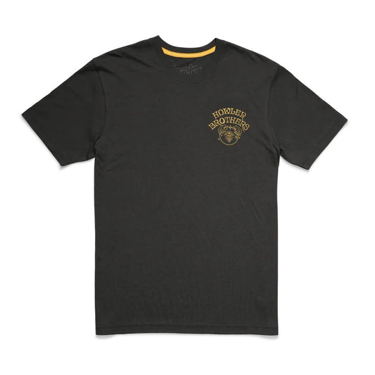 A front view of the Howler Brothers Select T in Antique Black with a yellow neck trim and a logo on the chest.