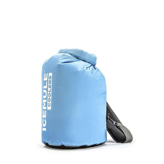 Side view of the IceMule Coolers Classic Cooler Large 20L in Crimson Red with a black shoulder strap against a white background.