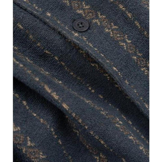 A close-up of the Jetty Men's Asbury Knit Button Down in Navy showing the button and knit fabric texture.