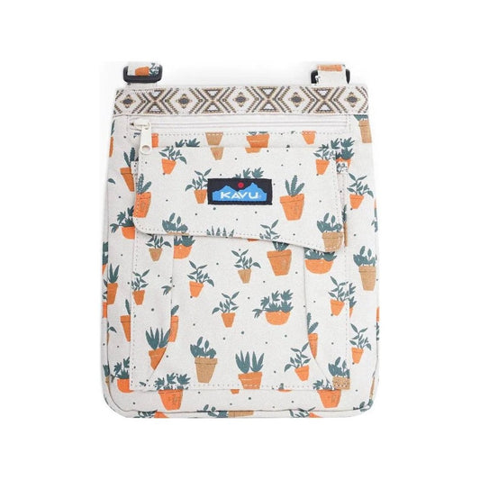 A front view of the Kavu Keeper Cactus Garden crossbody bag showing the front pocket and potted plant pattern against a white background.