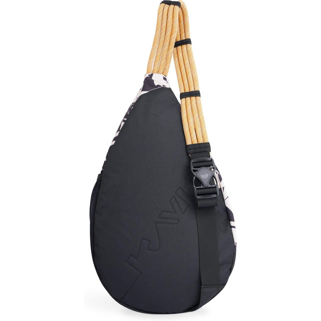 Side view of the Kavu Paxton Pack in BW Fronds showing the rope shoulder strap and black buckle against a white background.