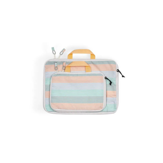 A front view of the Kavu Wander Packs in Calm Palm showing the front pocket and zipper pulls against a white background.