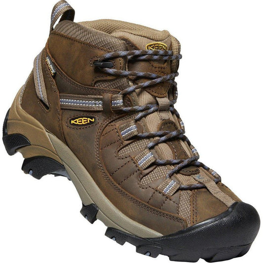 A side view of the Keen Women's Targhee II Waterproof Mid in Slate Black/Flint Stone showing the lugged outsole against a white background.