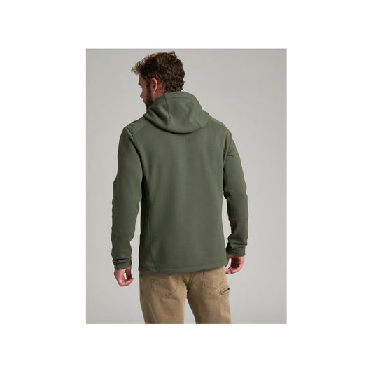 Back view of the Kuhl Men's Spekter Pull Over Hoody in Forest Green on a model against a light gray background.