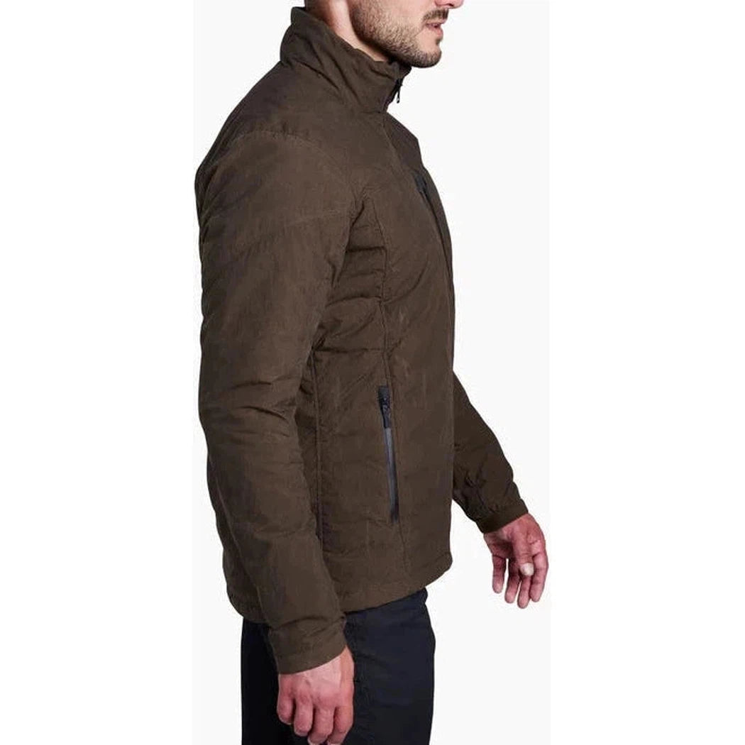 Side view of the Kuhl Men's Wyldefire Jacket in Turkish Coffee showing the zippered pocket against a white background.