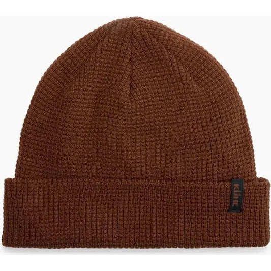 A front view of the Kuhl Rebel Thermal Beanie in Raven showing the ribbed cuff and brand tag on the right side against a white background.