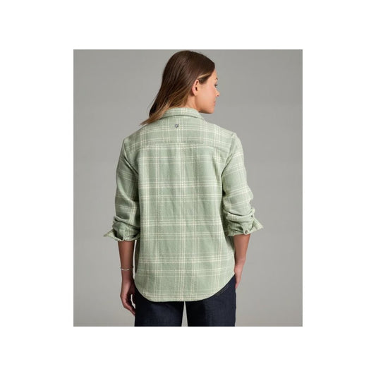 Back view of the Kuhl Women's Kove ShirtJak in Sea Crest showing rolled sleeves and a gray background.