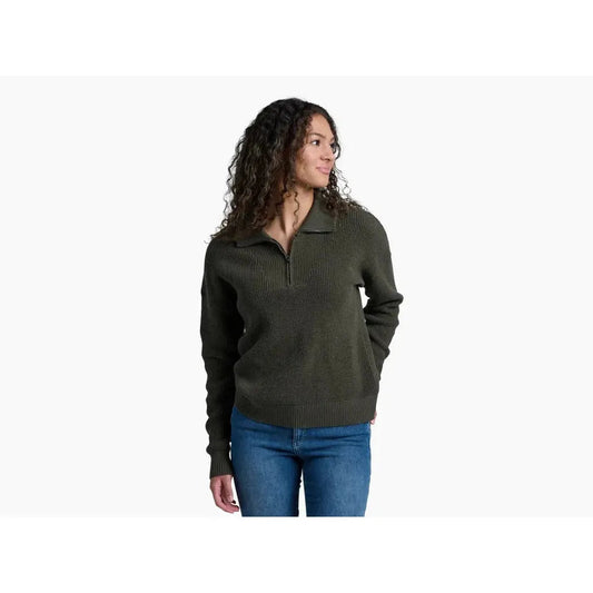 A woman wearing the Kuhl Women's Norda 1/4 Zip Sweater in Stone stands against a white background.