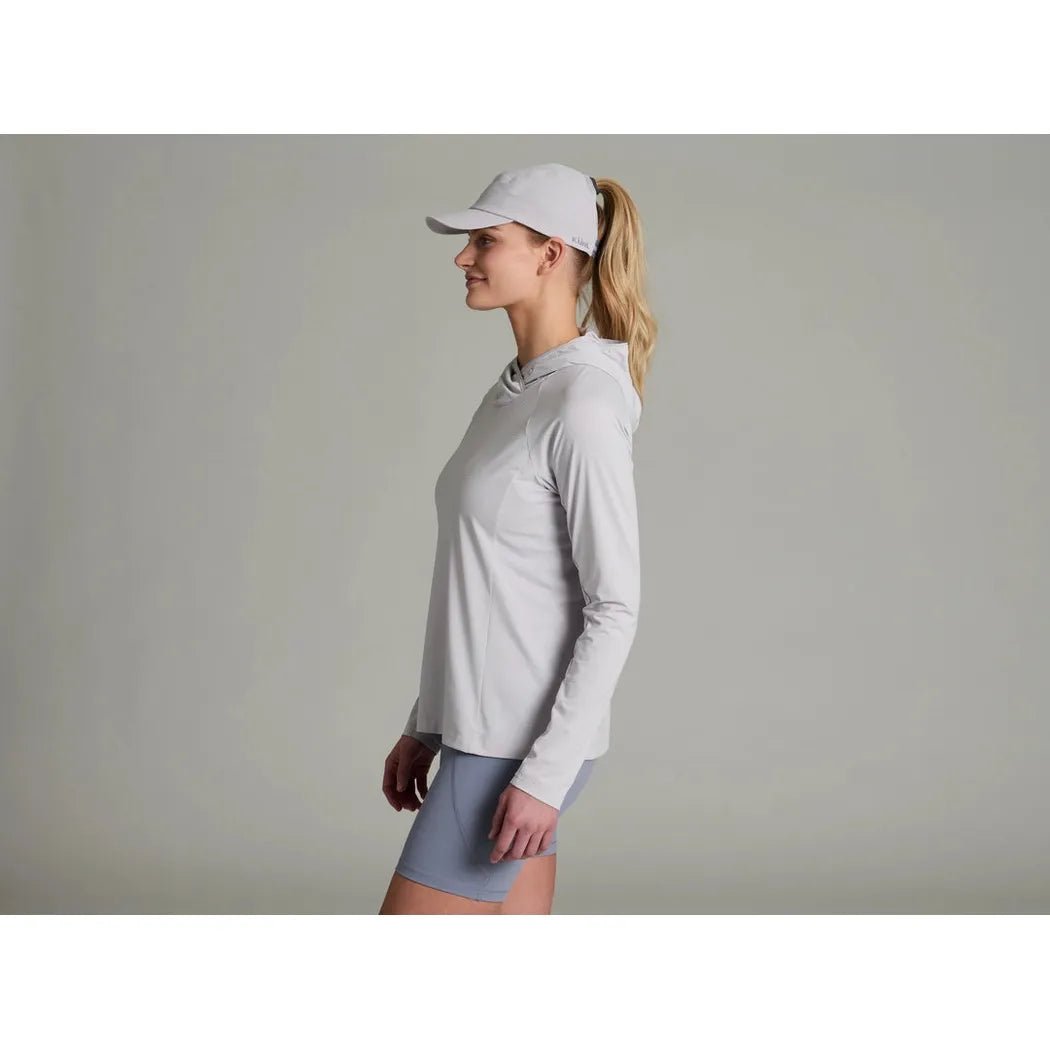Side view of the Kuhl Women's Solis Hoody in Lilac showing the model wearing it against a plain background.