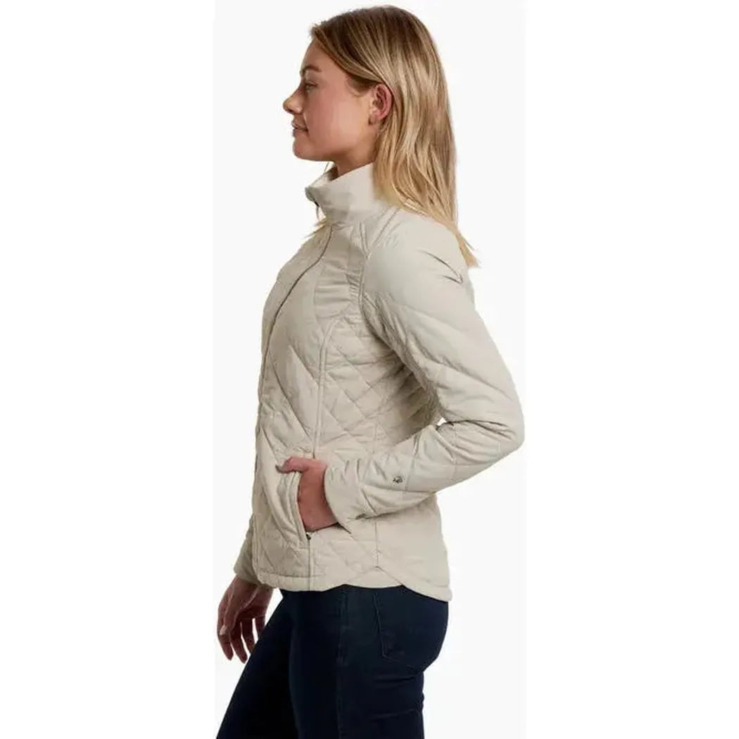 Side view of the Kuhl Women's Stunnr Insulated Jacket in Coffee showing the model wearing it against a white background.