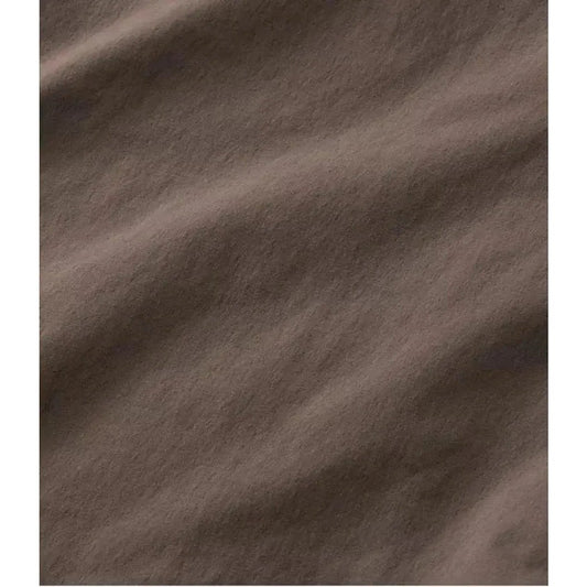 The L.L.Bean Men's Cresta Hiking Zip Off Pant in Dark Cinder shows the fabric texture and natural wrinkles from the camera angle.