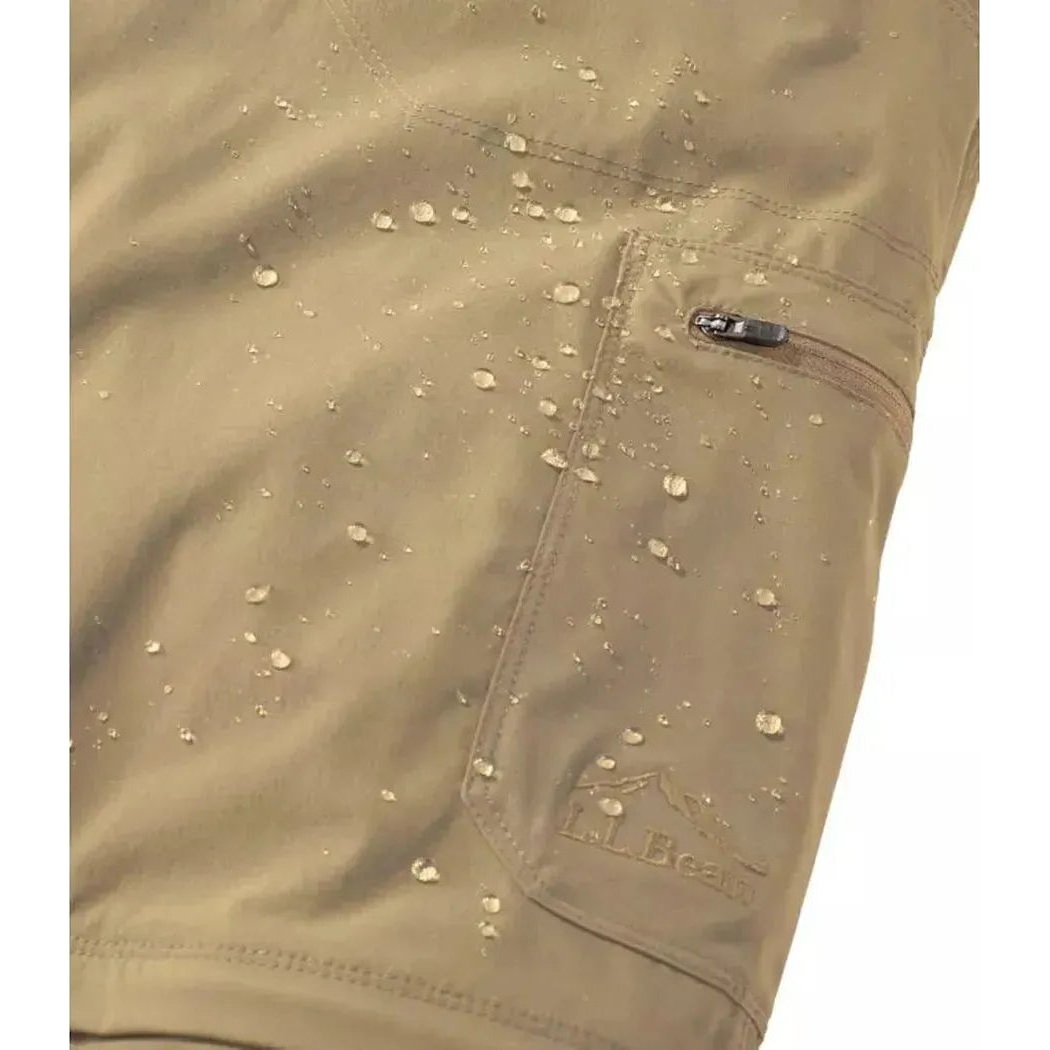 A close-up of the L.L.Bean Men's Cresta Hiking Zip Off Pant in Dark Cinder showing water droplets on the fabric and a zippered pocket.