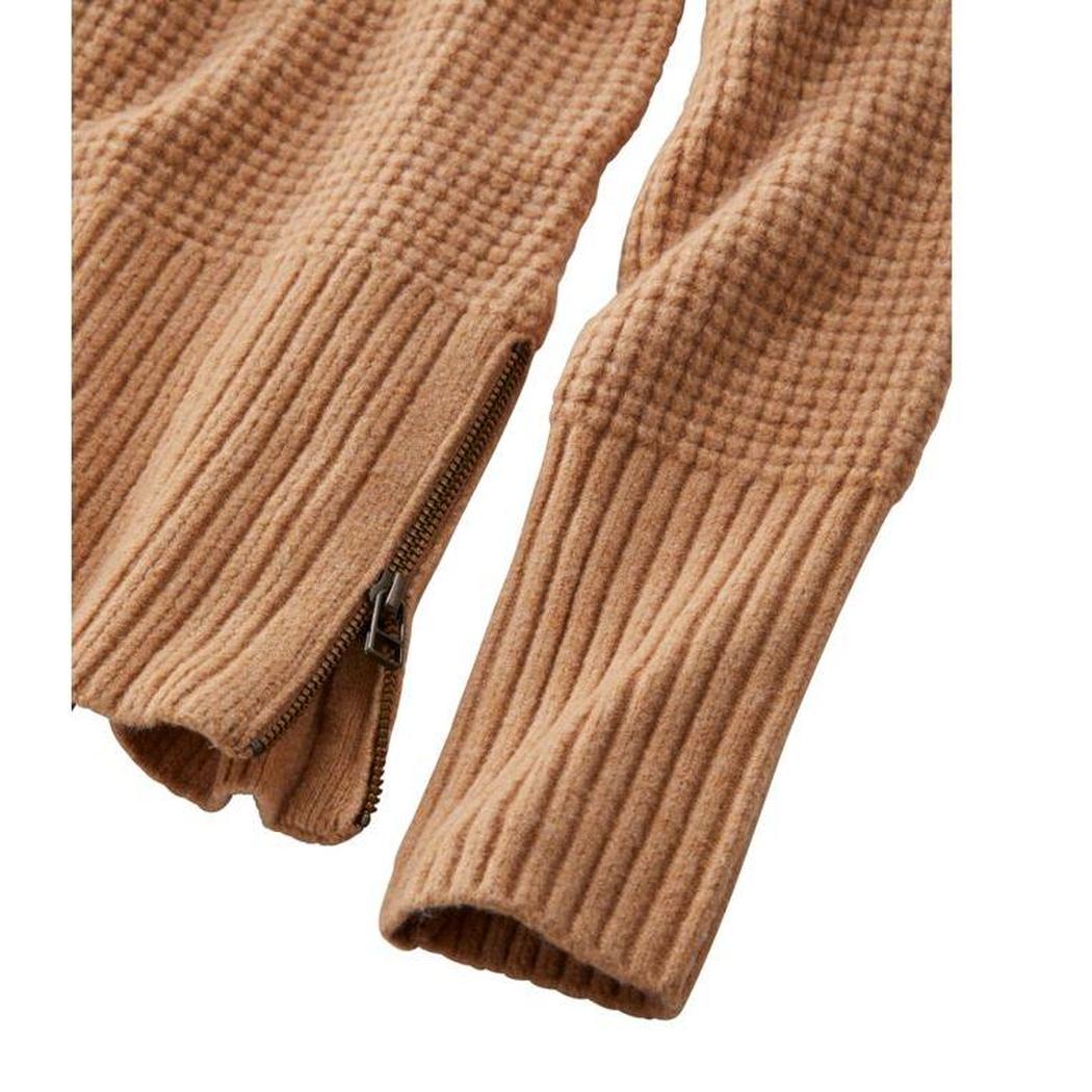 Side view of the L.L.Bean Women's SuperSoft Waffle Turtleneck Sweater showing the zipper on the sleeve cuff against a white background.