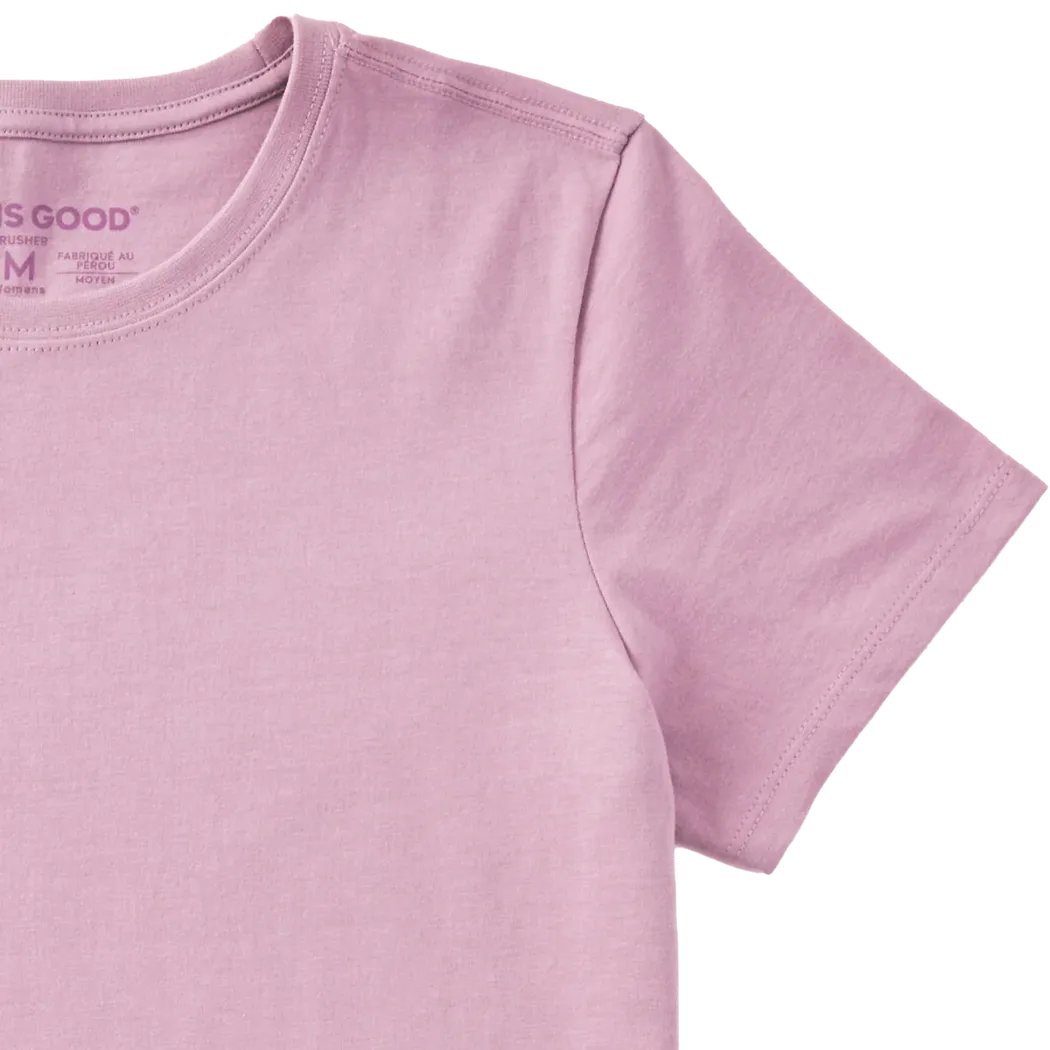 A close-up of the Life is Good Women's Array of Flowers Short Sleeve Crusher Tee in Violet Purple showing the collar and sleeve against a white background.