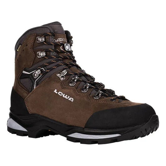 A side view of the Lowa Camino Evo GTX men's hiking boot in Brown/Graphite with a rugged outsole against a white background.