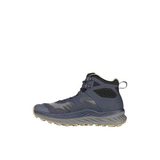 Side view of the Lowa Men's Fortux GTX QC in Navy/Dune showing the lugged outsole against a white background.